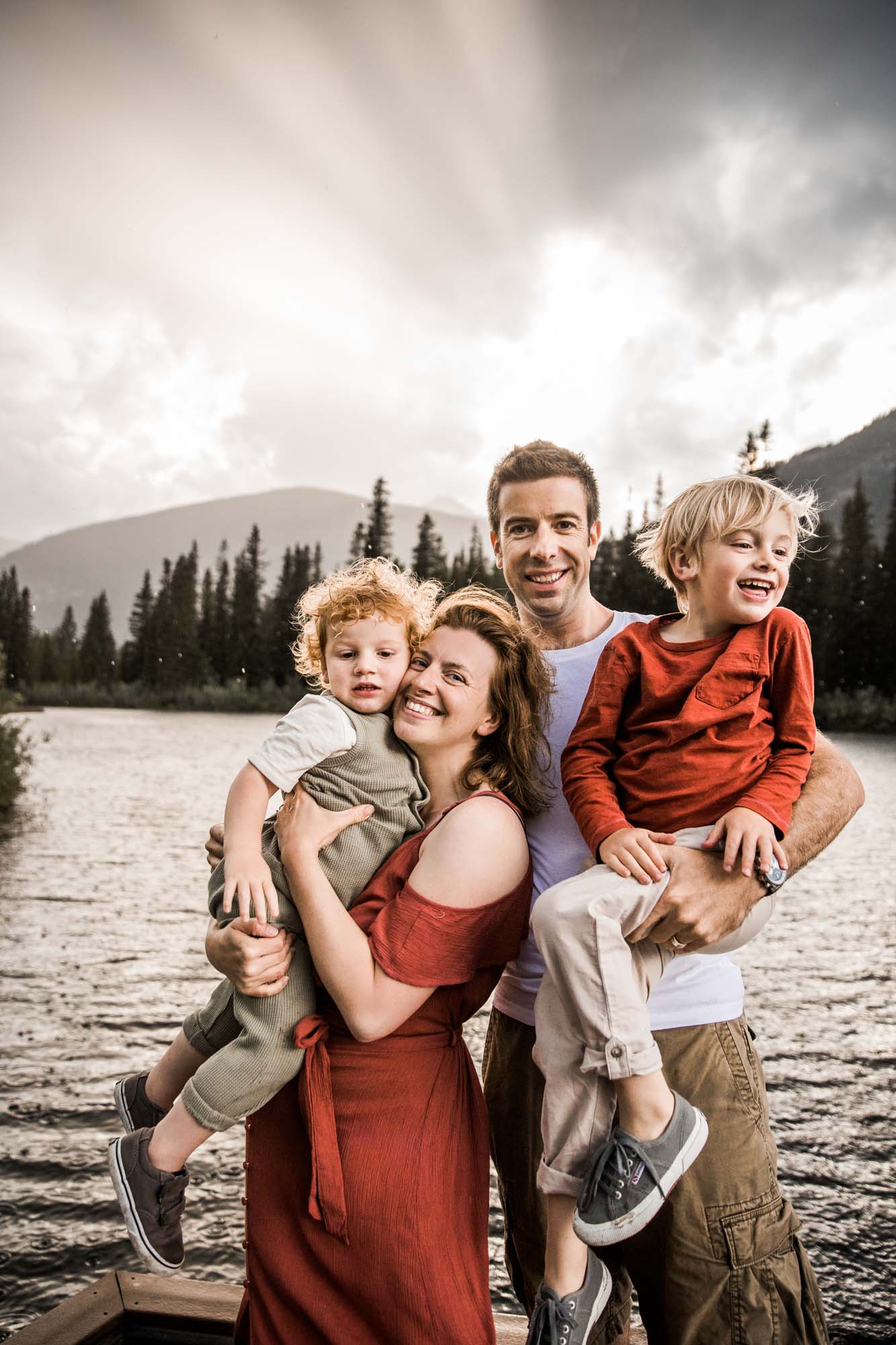 Kananaksis Country, Banff, Canmore family photographer, family photos in the mountains on a hot summer night when the rain started to pour, huge thunderstorm family shoot