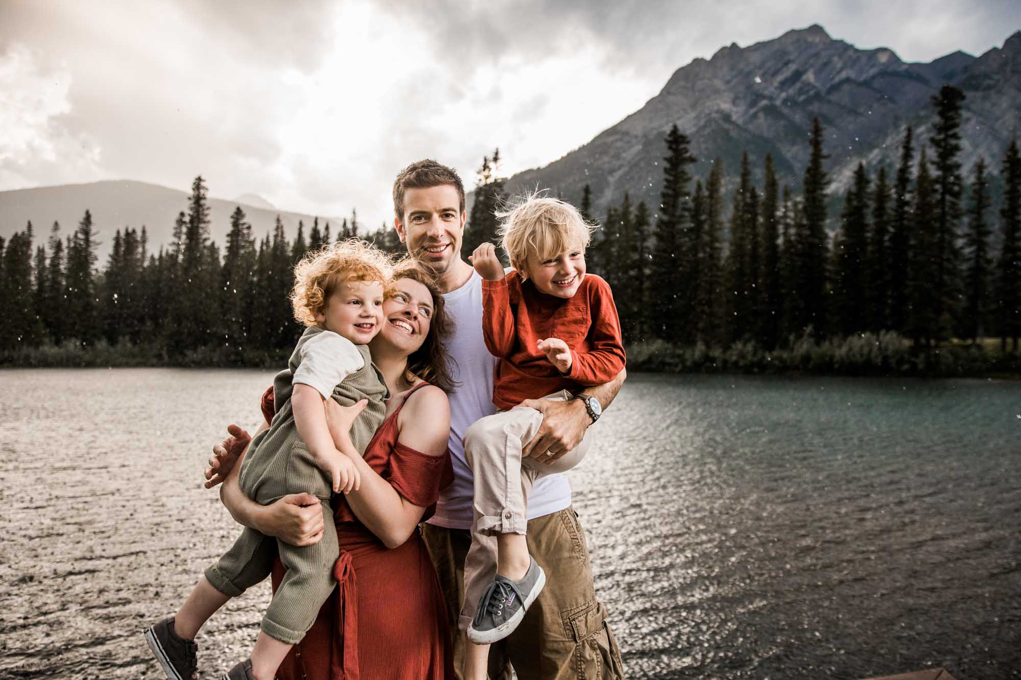Kananaksis Country, Banff, Canmore family photographer, family photos in the mountains on a hot summer night when the rain started to pour, huge thunderstorm family shoot