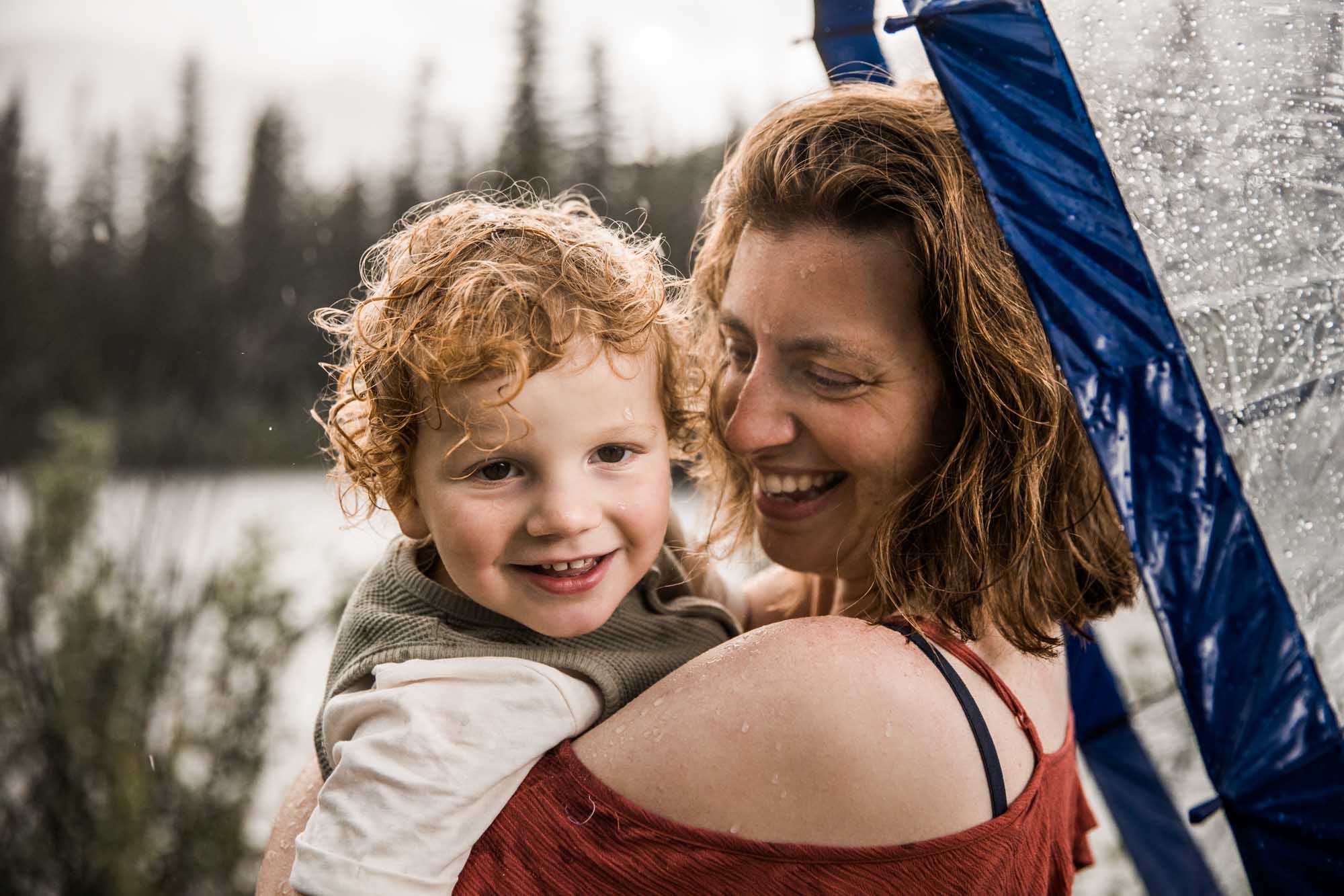 Kananaksis Country, Banff, Canmore family photographer, family photos in the mountains on a hot summer night when the rain started to pour, huge thunderstorm family shoot