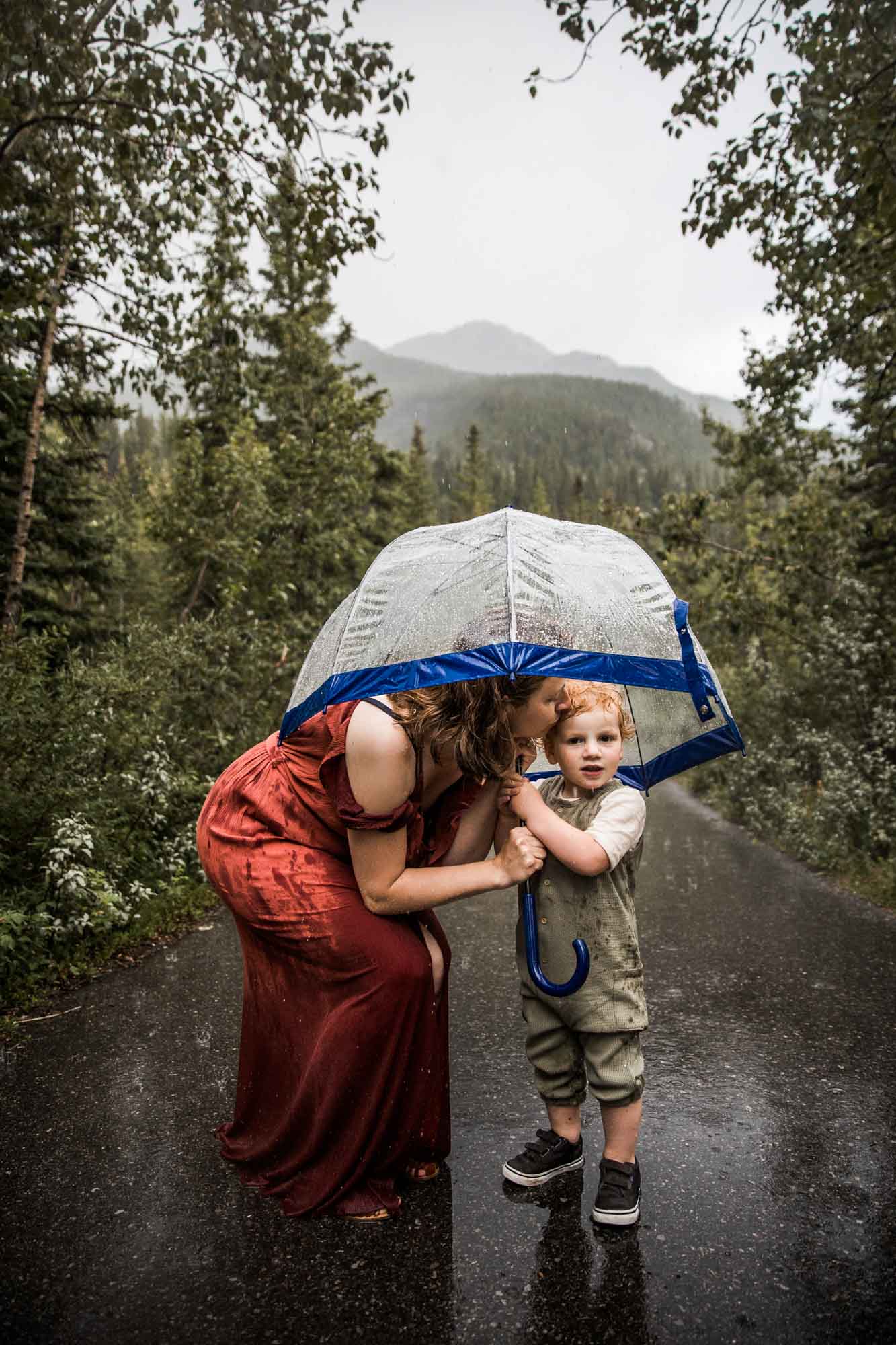 Kananaksis Country, Banff, Canmore family photographer, family photos in the mountains on a hot summer night when the rain started to pour, huge thunderstorm family shoot