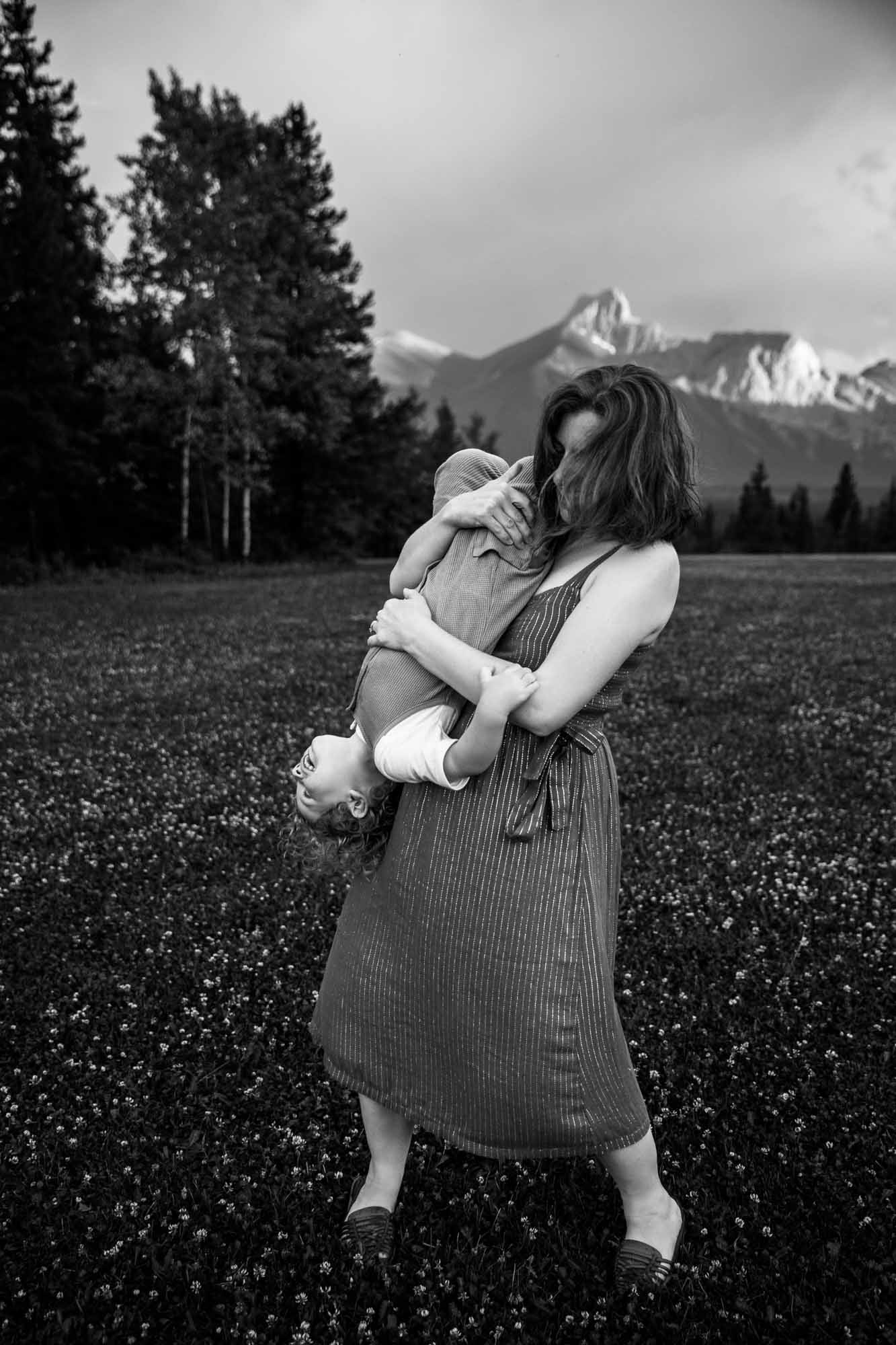 Kananaksis Country, Banff, Canmore family photographer, family photos in the mountains on a hot summer night when the rain started to pour, huge thunderstorm family shoot