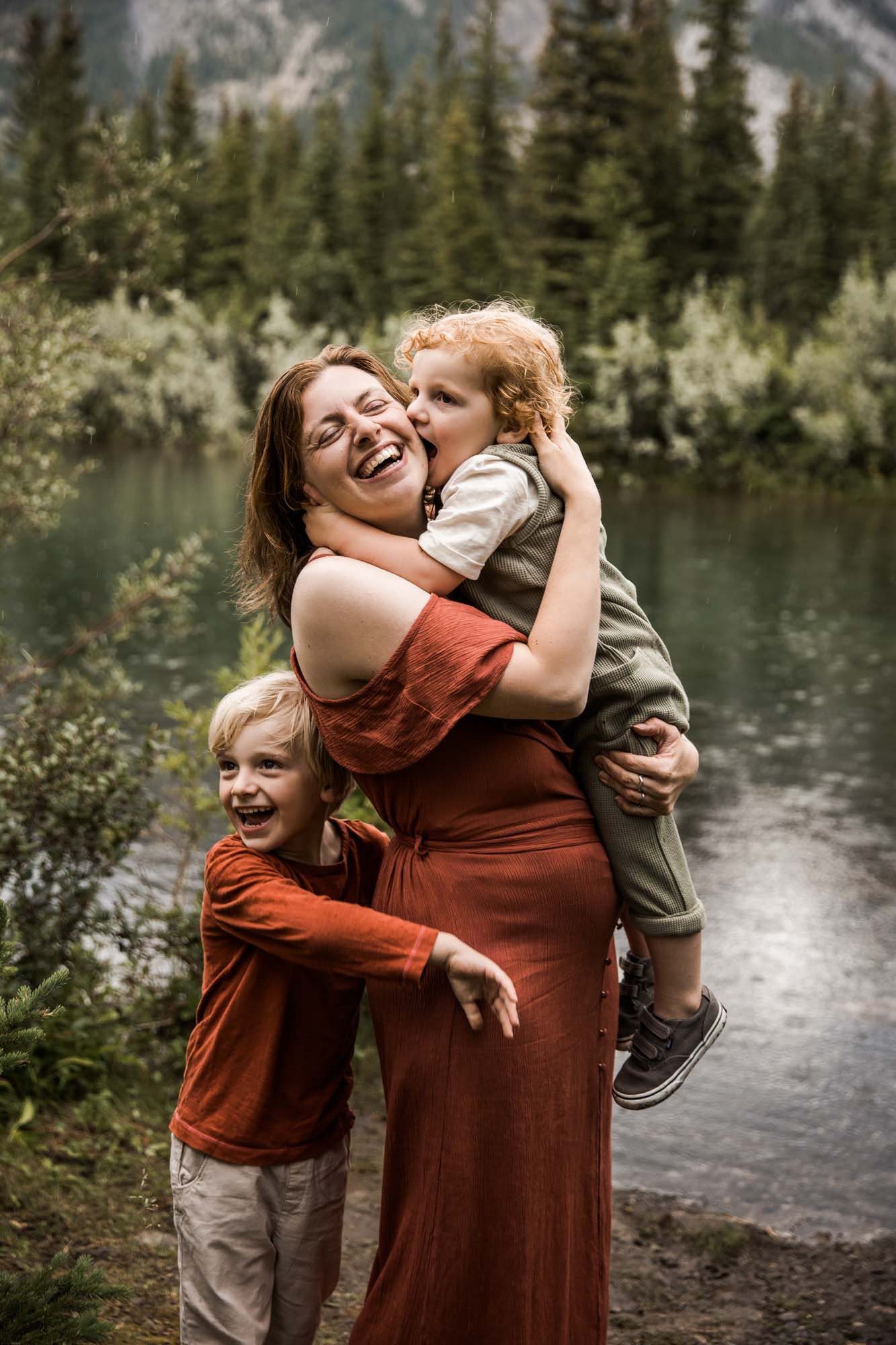 Kananaksis Country, Banff, Canmore family photographer, family photos in the mountains on a hot summer night when the rain started to pour, huge thunderstorm family shoot