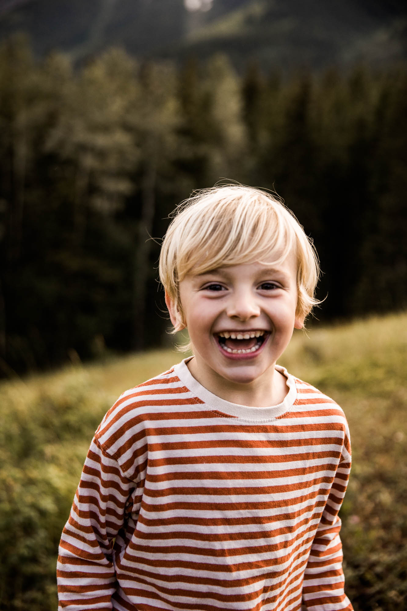 Kananaksis Country, Banff, Canmore family photographer, family photos in the mountains on a hot summer night when the rain started to pour, huge thunderstorm family shoot