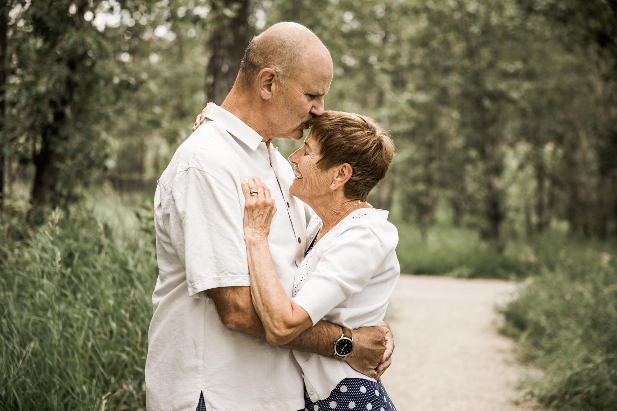 Posing prompts for couples, engagement, wedding photography, couple being posed by photographer during engagement or wedding photos