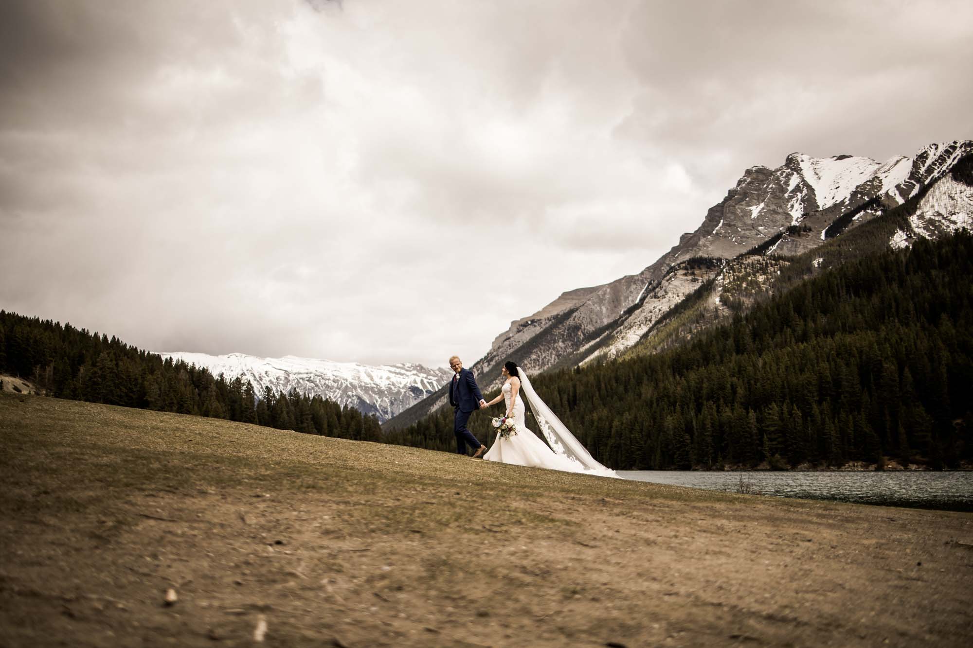 Posing prompts for couples, engagement, wedding photography, couple being posed by photographer during engagement or wedding photos