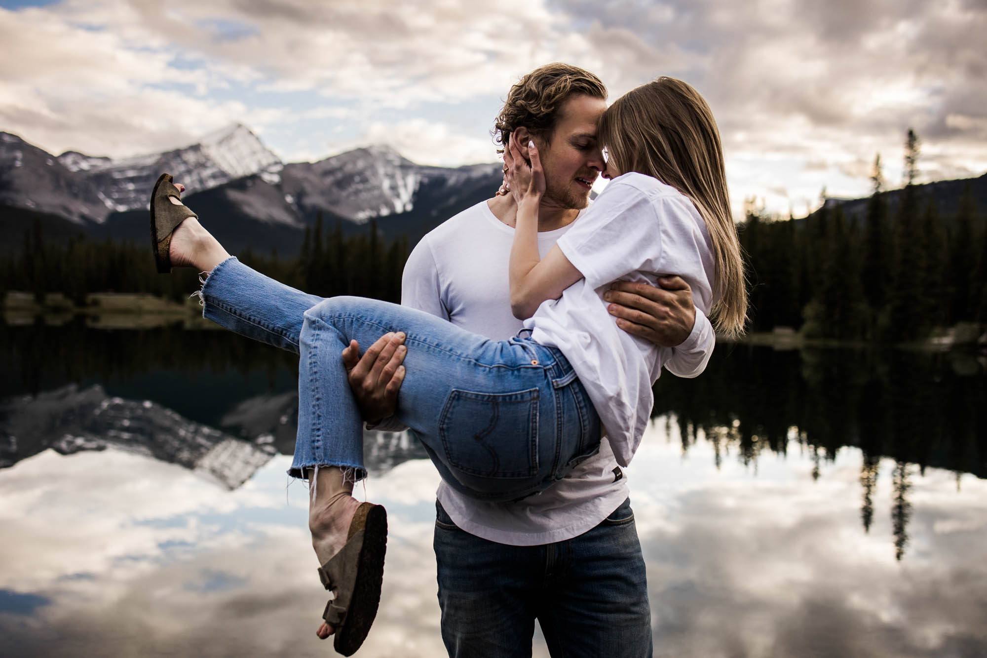 Posing prompts for couples, engagement, wedding photography, couple being posed by photographer during engagement or wedding photos