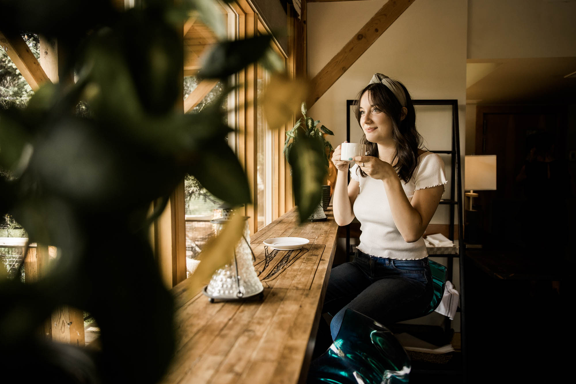 Calgary branding and headshot photographer, copywriter posing for her headshots and branding photos at Bowness Park in the summer