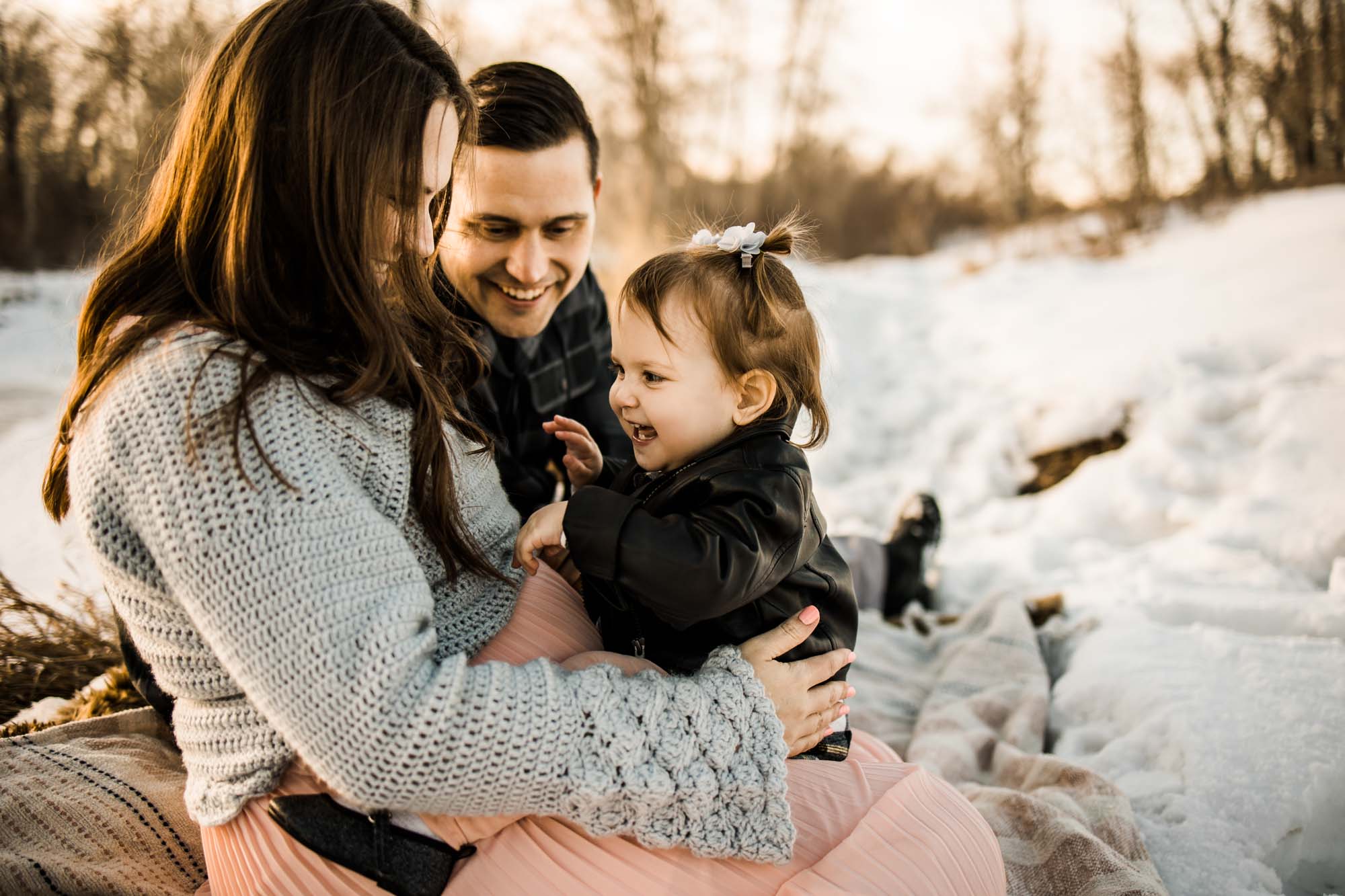 Calgary maternity and newborn photographer, maternity photos with a pregant future mom and toddler daughter at Carburn Park in Calgary