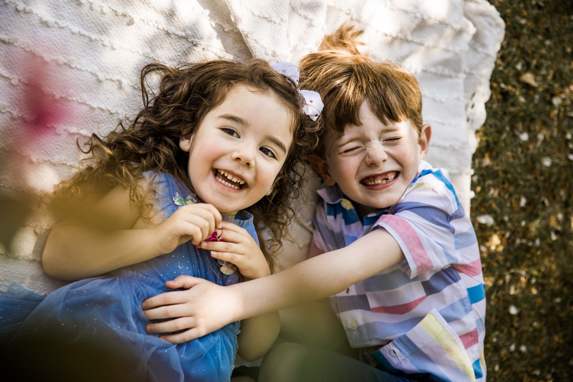 Calgary, Banff and Canmore lifestyle family photographer, family in Baker Park posing for their photos