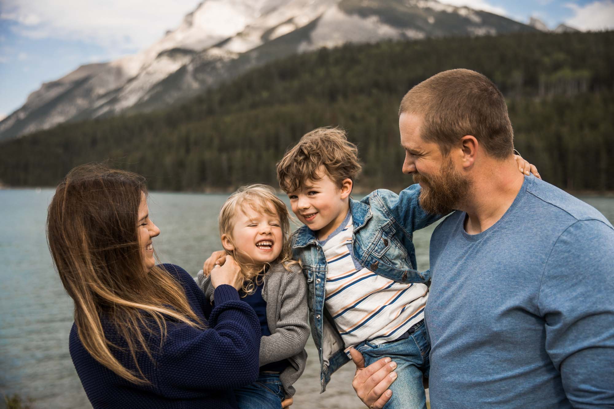 Calgary, Banff and Canmore lifestyle family photographer, family in the mountains posing for their photos