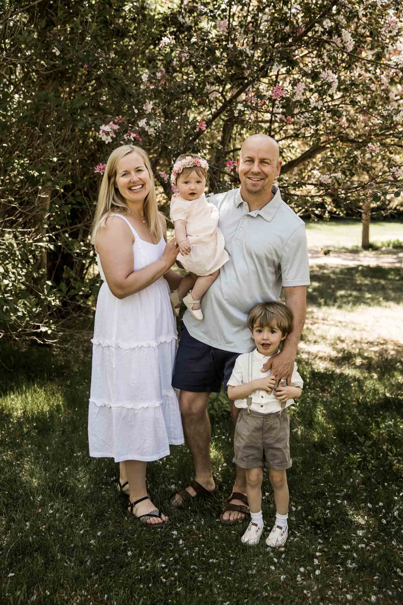 Calgary, Banff and Canmore lifestyle family photographer, family in Baker Park posing for their photos
