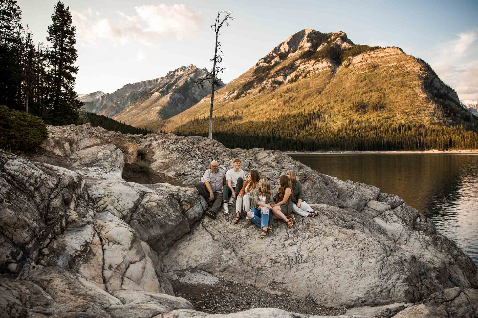 Calgary, Banff, Kananaskis Country lifestyle family photographer, family with older kids posing in the mountains for their photos during their vacation in Banff