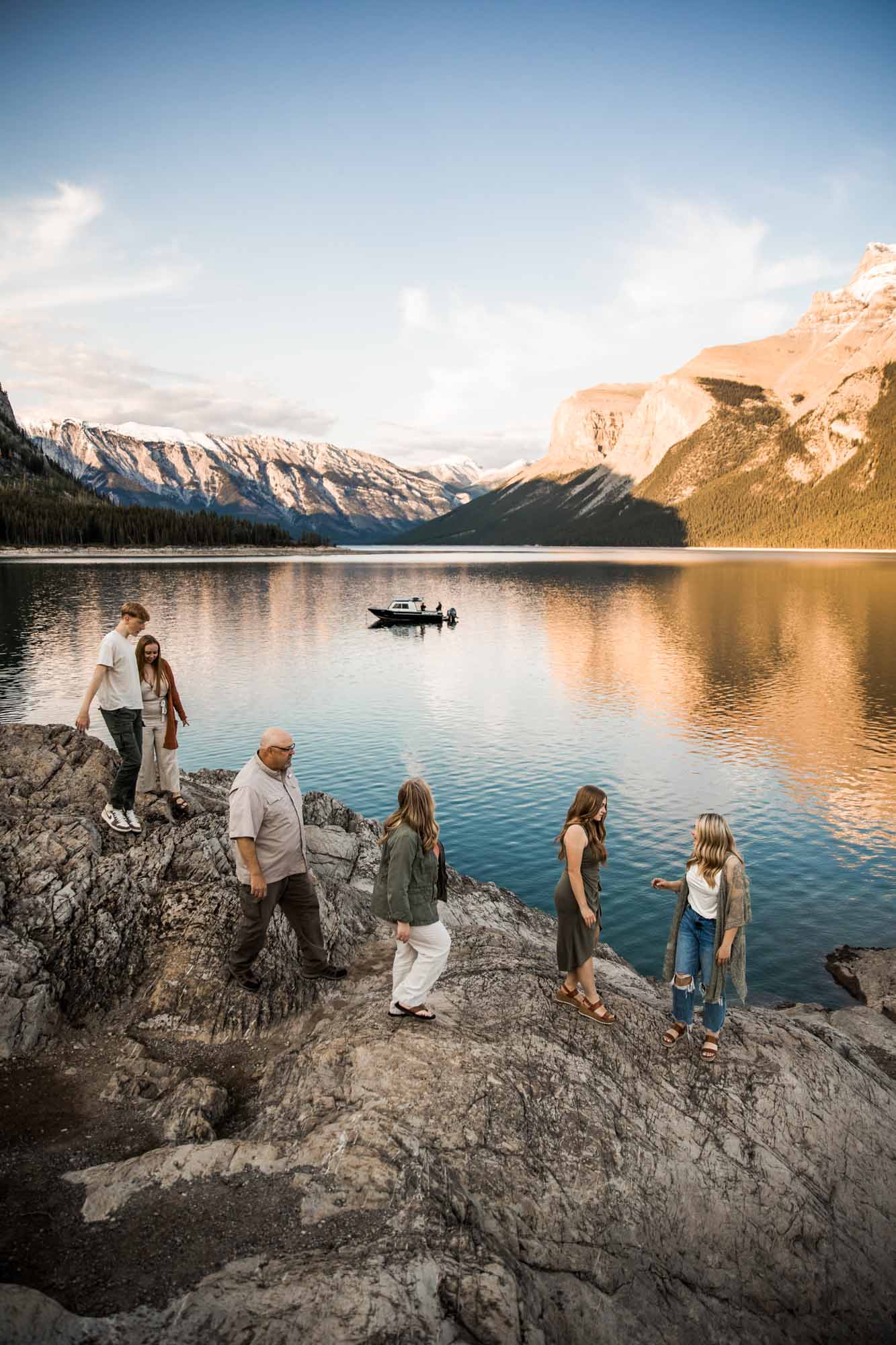 Calgary, Banff, Kananaskis Country lifestyle family photographer, family with older kids posing in the mountains for their photos during their vacation in Banff