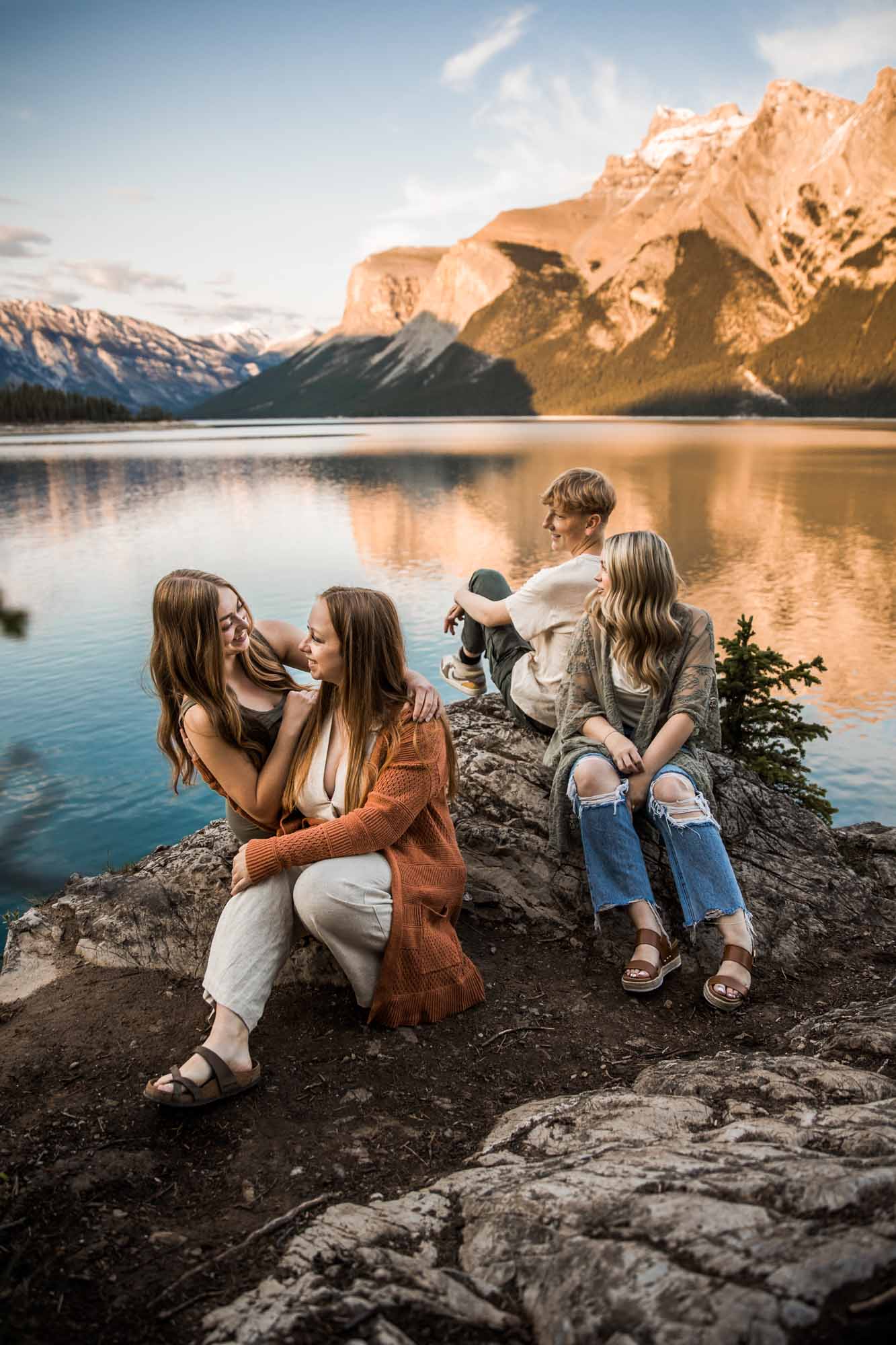 Calgary, Banff, Kananaskis Country lifestyle family photographer, family with older kids posing in the mountains for their photos during their vacation in Banff