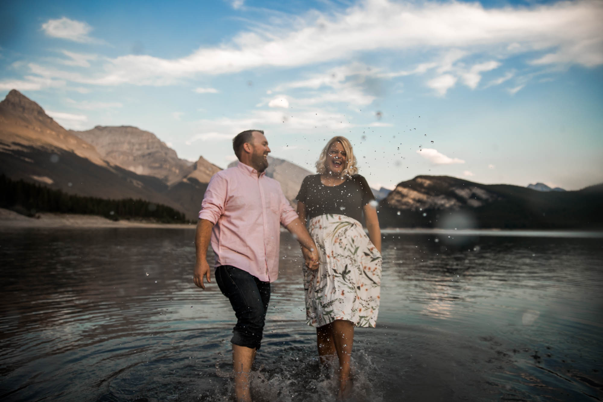 Calgary, Banff, Kananaskis Country lifestyle maternity and newborn photographer, couple posing in the mountains in Kananaskis Country for their maternity photos