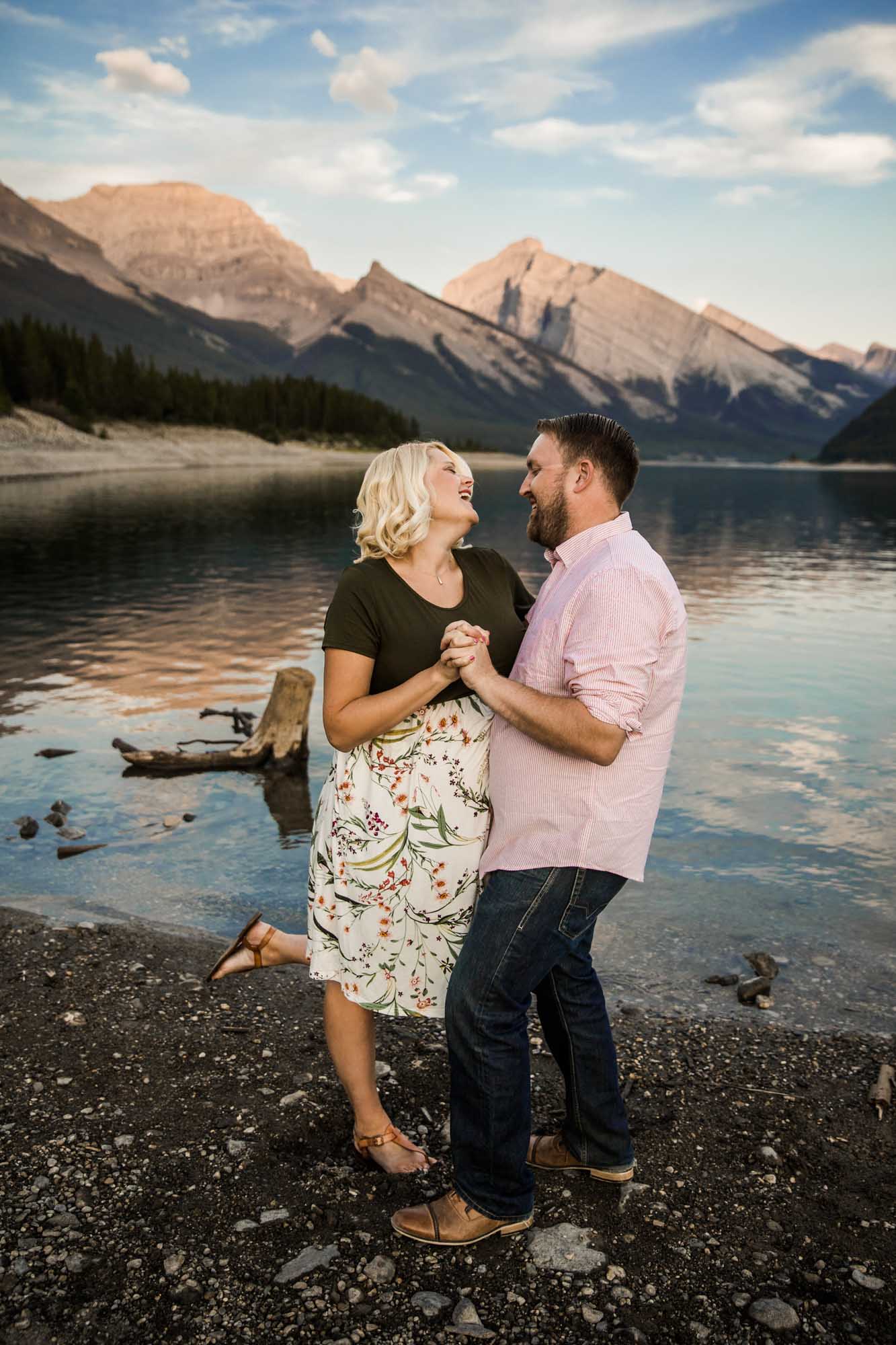 Calgary, Banff, Kananaskis Country lifestyle maternity and newborn photographer, couple posing in the mountains in Kananaskis Country for their maternity photos