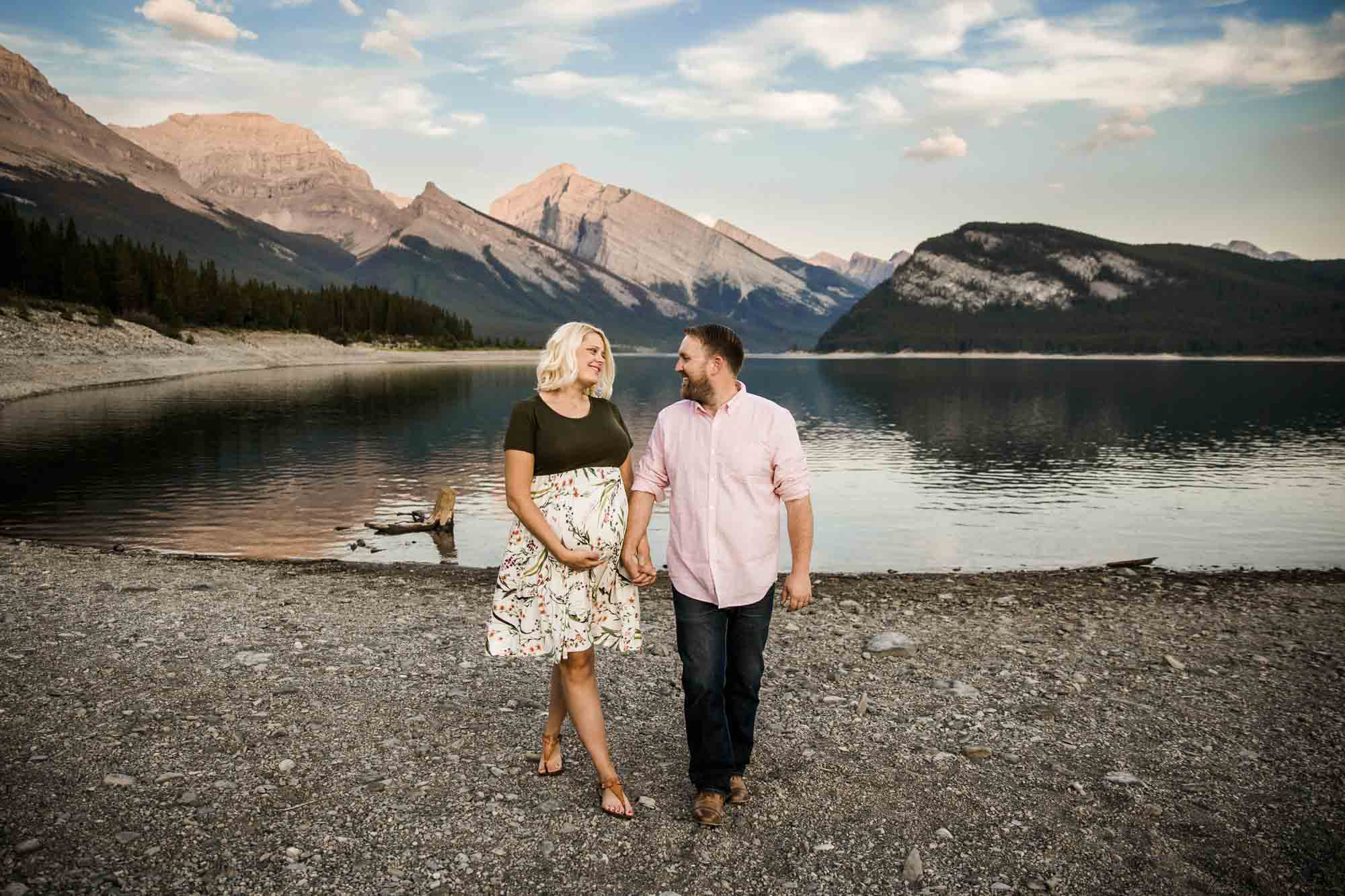 Calgary, Banff, Kananaskis Country lifestyle maternity and newborn photographer, couple posing in the mountains in Kananaskis Country for their maternity photos