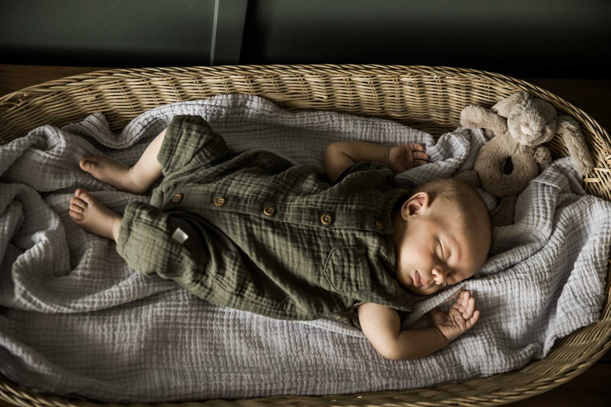 Calgary lifestyle maternity and newborn photographer, family with their newborn baby during their in-home photo session