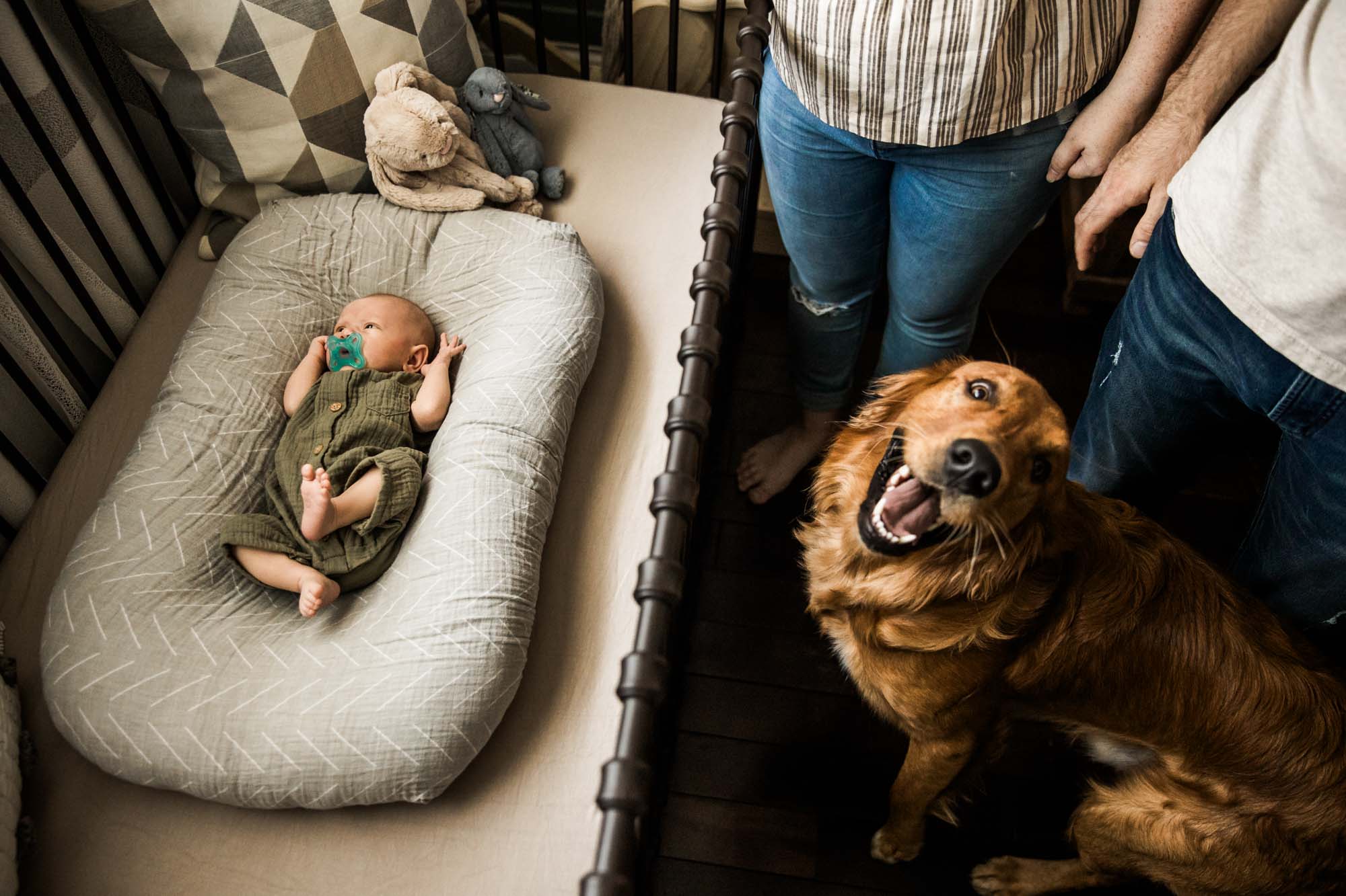 Calgary lifestyle maternity and newborn photographer, family with their newborn baby during their in-home photo session
