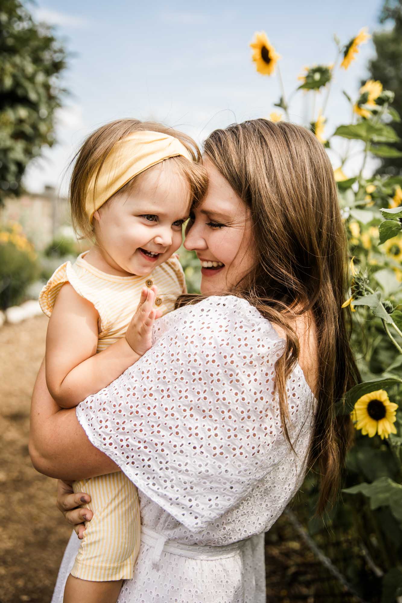 Calgary, Banff, Kananaskis Country lifestyle family photographer, natural and candid photos of a family at the Botanical Gardens of Silver Springs