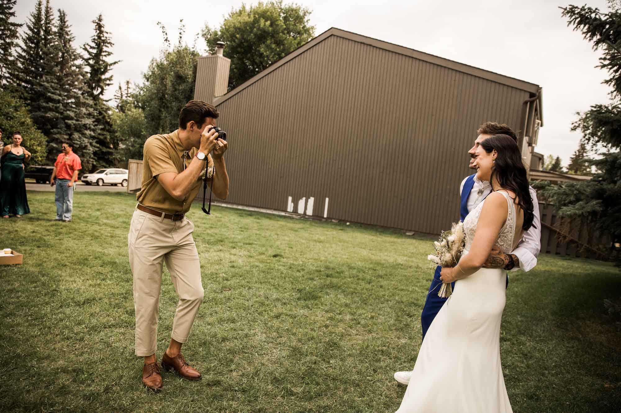 Calgary wedding photographer, candid photos of a micro intimate wedding at Two House Brewery small casual restaurant downtown Calgary