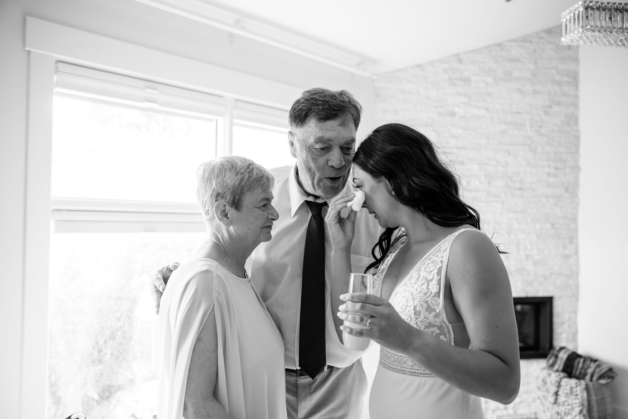 Calgary wedding photographer, candid photos of a micro intimate wedding at Two House Brewery small casual restaurant downtown Calgary