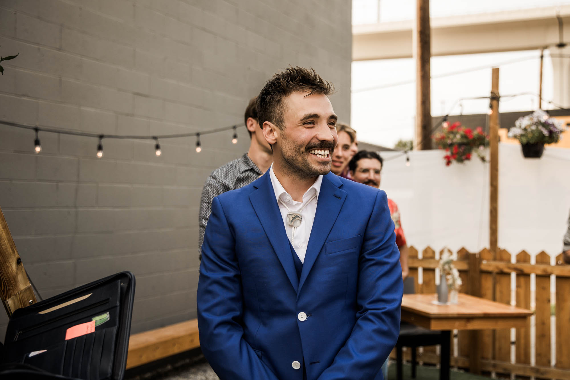 Calgary wedding photographer, candid photos of a micro intimate wedding at Two House Brewery small casual restaurant downtown Calgary