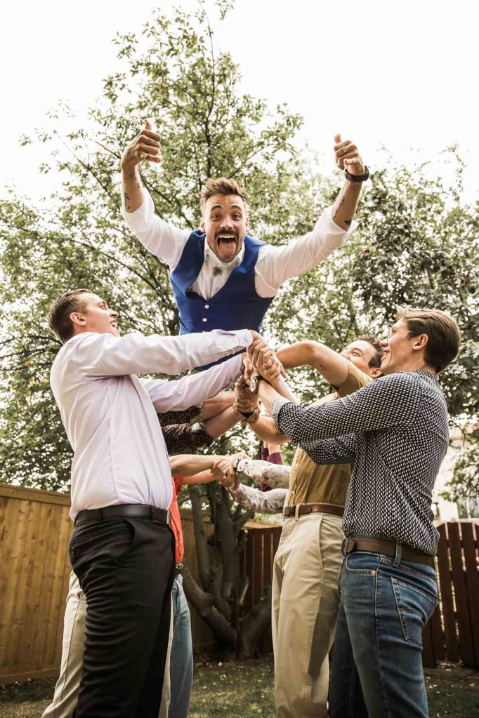 Calgary wedding photographer, candid photos of a micro intimate wedding at Two House Brewery small casual restaurant downtown Calgary