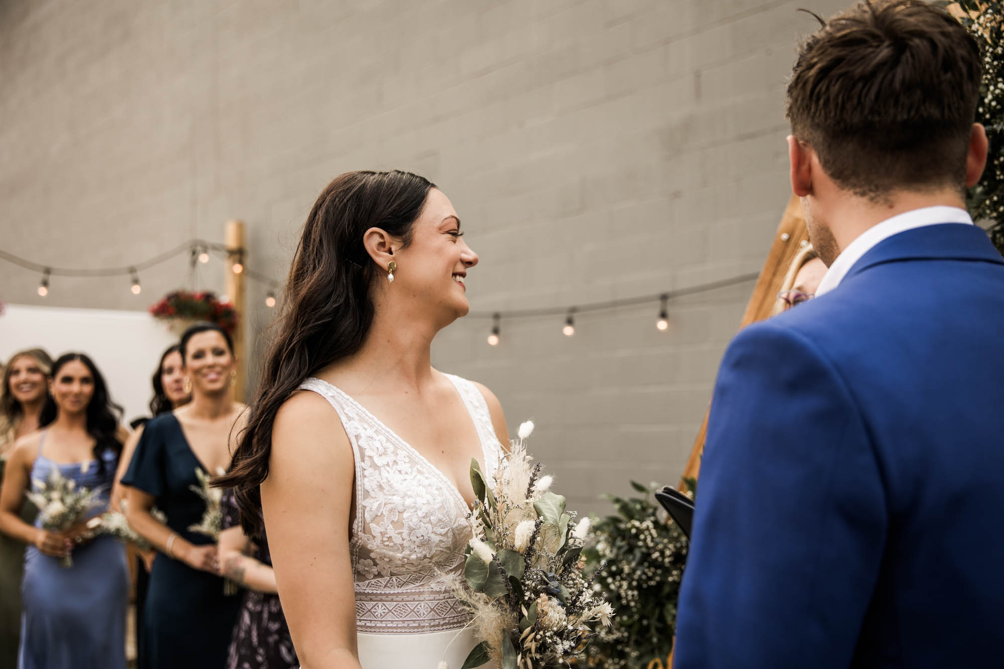 Calgary wedding photographer, candid photos of a micro intimate wedding at Two House Brewery small casual restaurant downtown Calgary