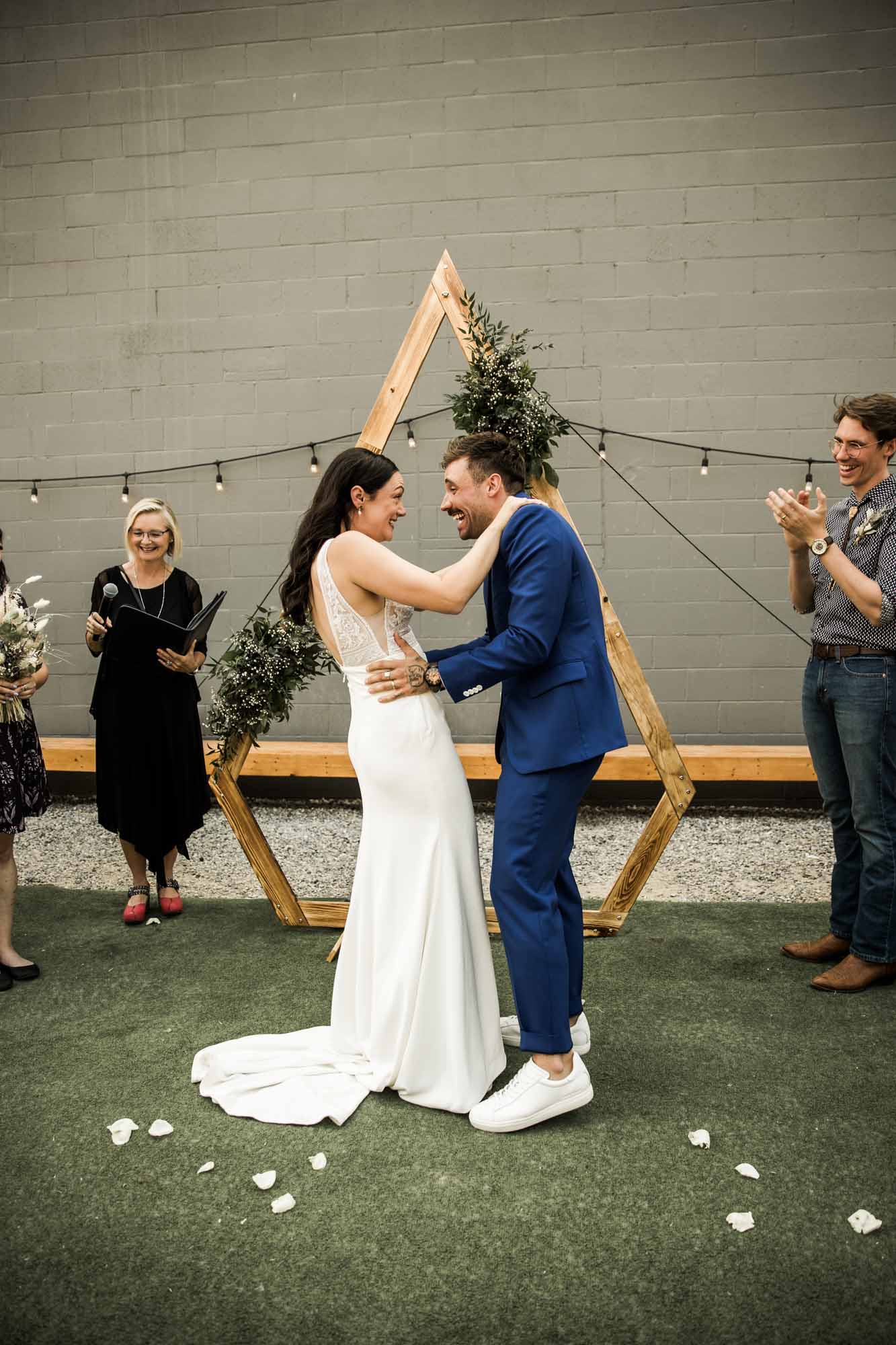 Calgary wedding photographer, candid photos of a micro intimate wedding at Two House Brewery small casual restaurant downtown Calgary