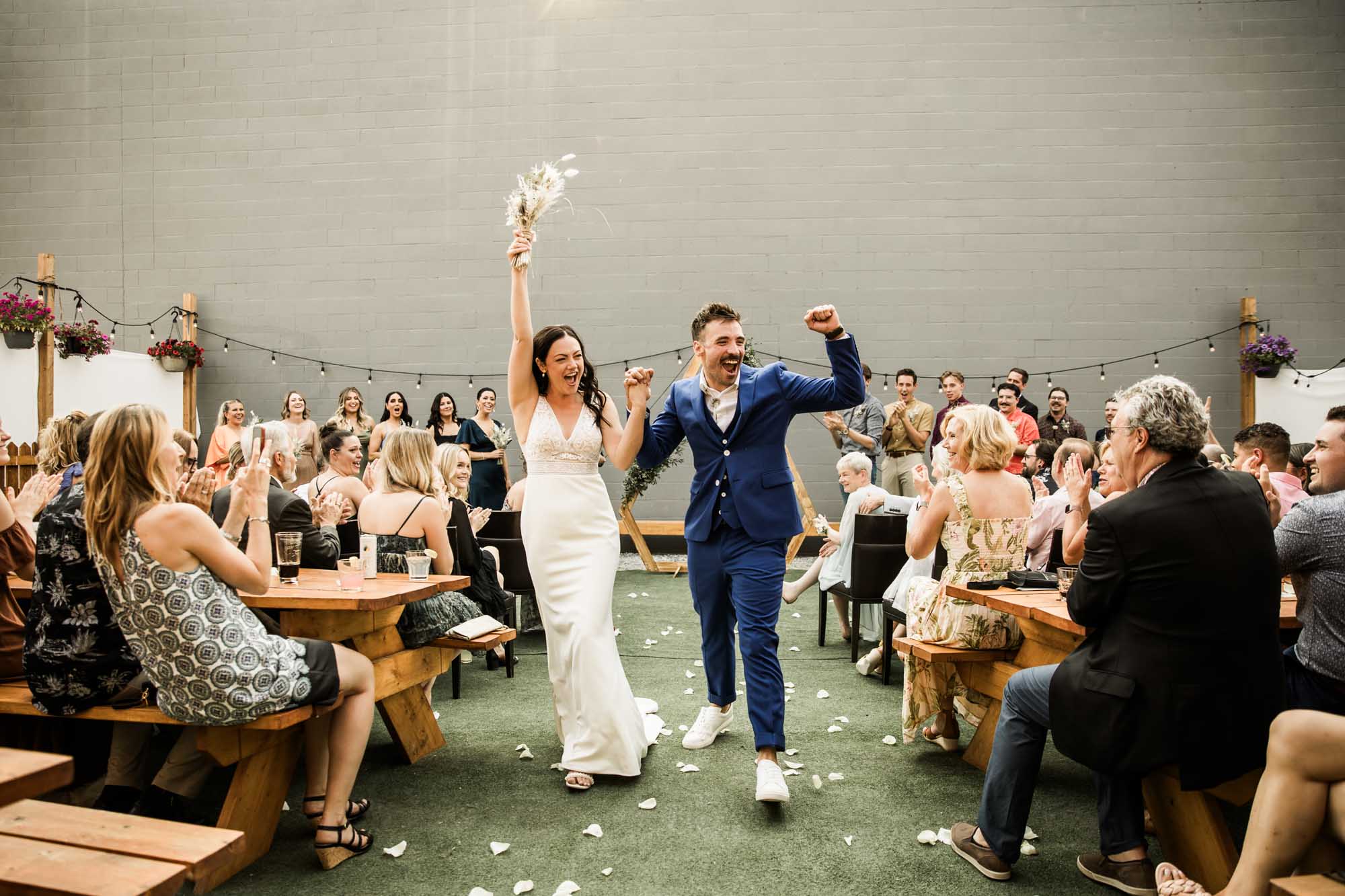 Calgary wedding photographer, candid photos of a micro intimate wedding at Two House Brewery small casual restaurant downtown Calgary