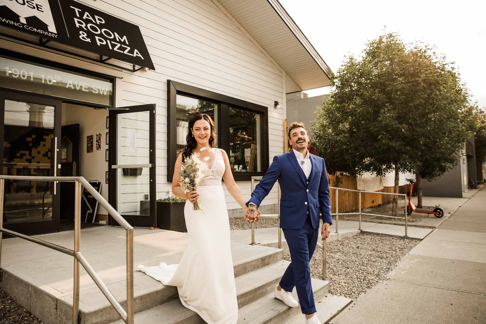 Calgary wedding photographer, candid photos of a micro intimate wedding at Two House Brewery small casual restaurant downtown Calgary