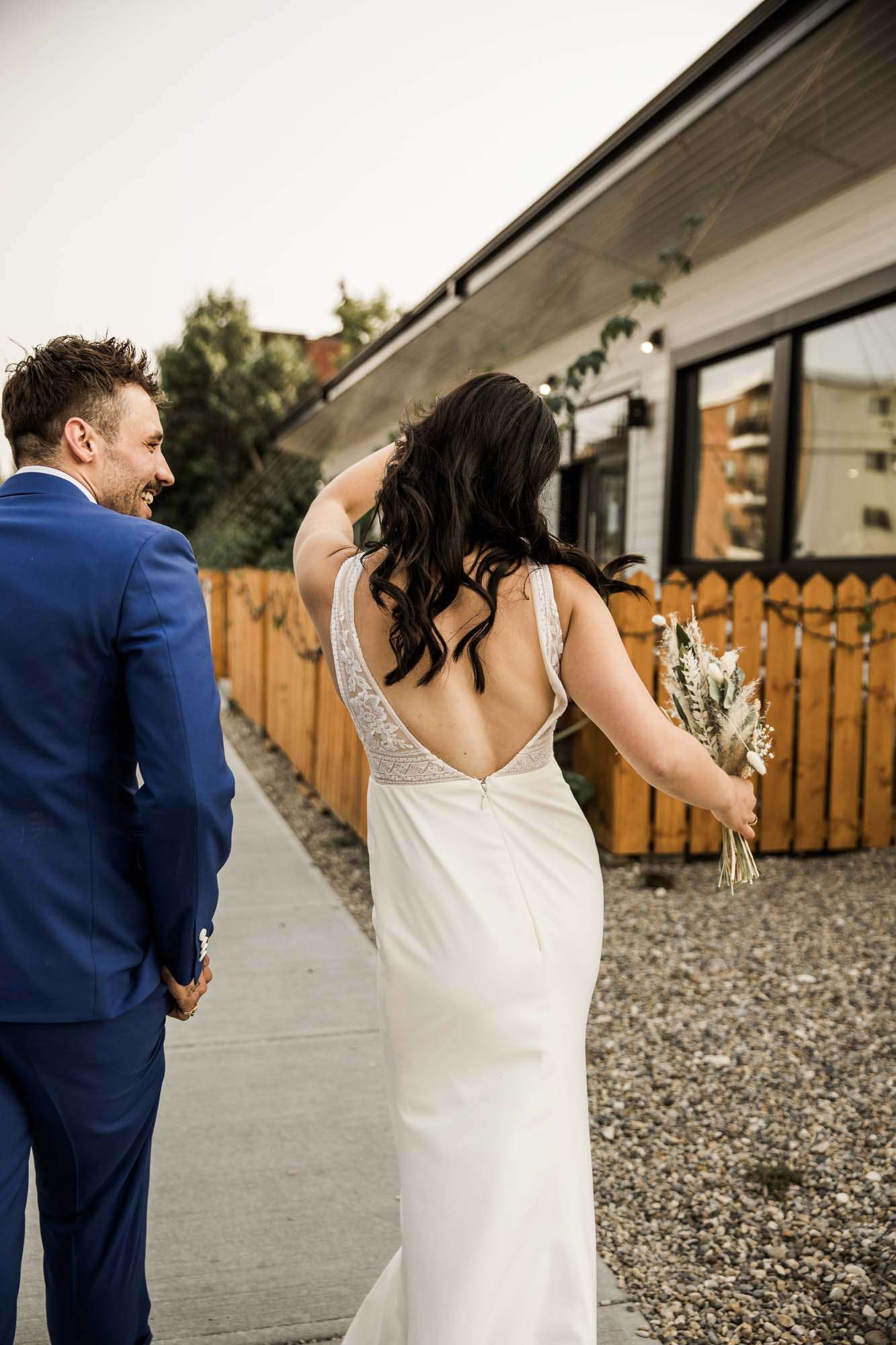 Calgary wedding photographer, candid photos of a micro intimate wedding at Two House Brewery small casual restaurant downtown Calgary