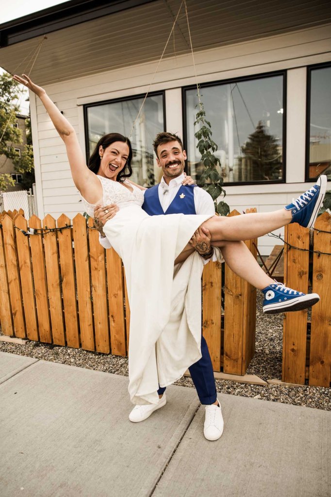 Calgary wedding photographer, candid photos of a micro intimate wedding at Two House Brewery small casual restaurant downtown Calgary