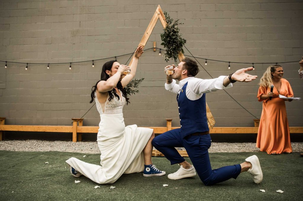 Calgary wedding photographer, candid photos of a micro intimate wedding at Two House Brewery small casual restaurant downtown Calgary