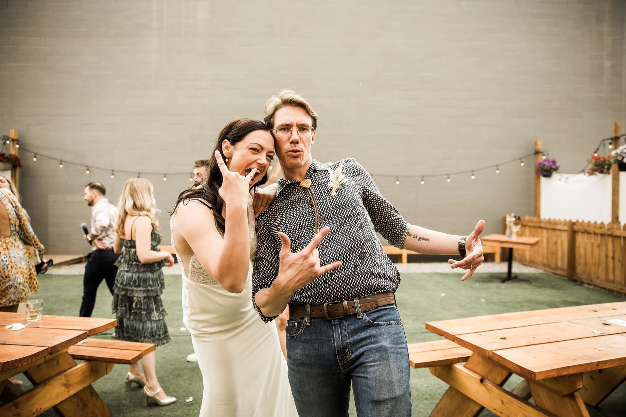 Calgary wedding photographer, candid photos of a micro intimate wedding at Two House Brewery small casual restaurant downtown Calgary