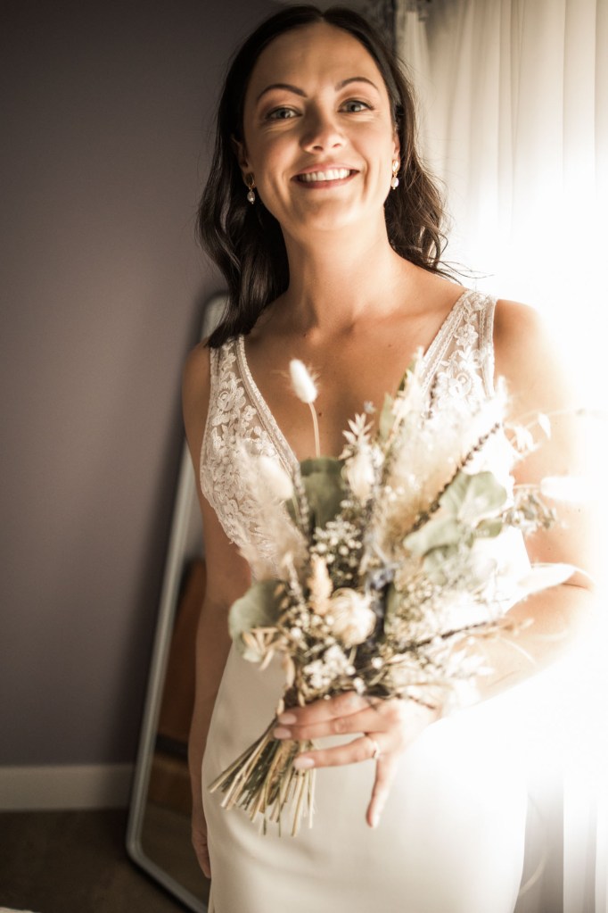 Calgary wedding photographer, candid photos of a micro intimate wedding at Two House Brewery small casual restaurant downtown Calgary