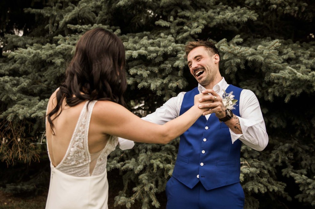 Calgary wedding photographer, candid photos of a micro intimate wedding at Two House Brewery small casual restaurant downtown Calgary