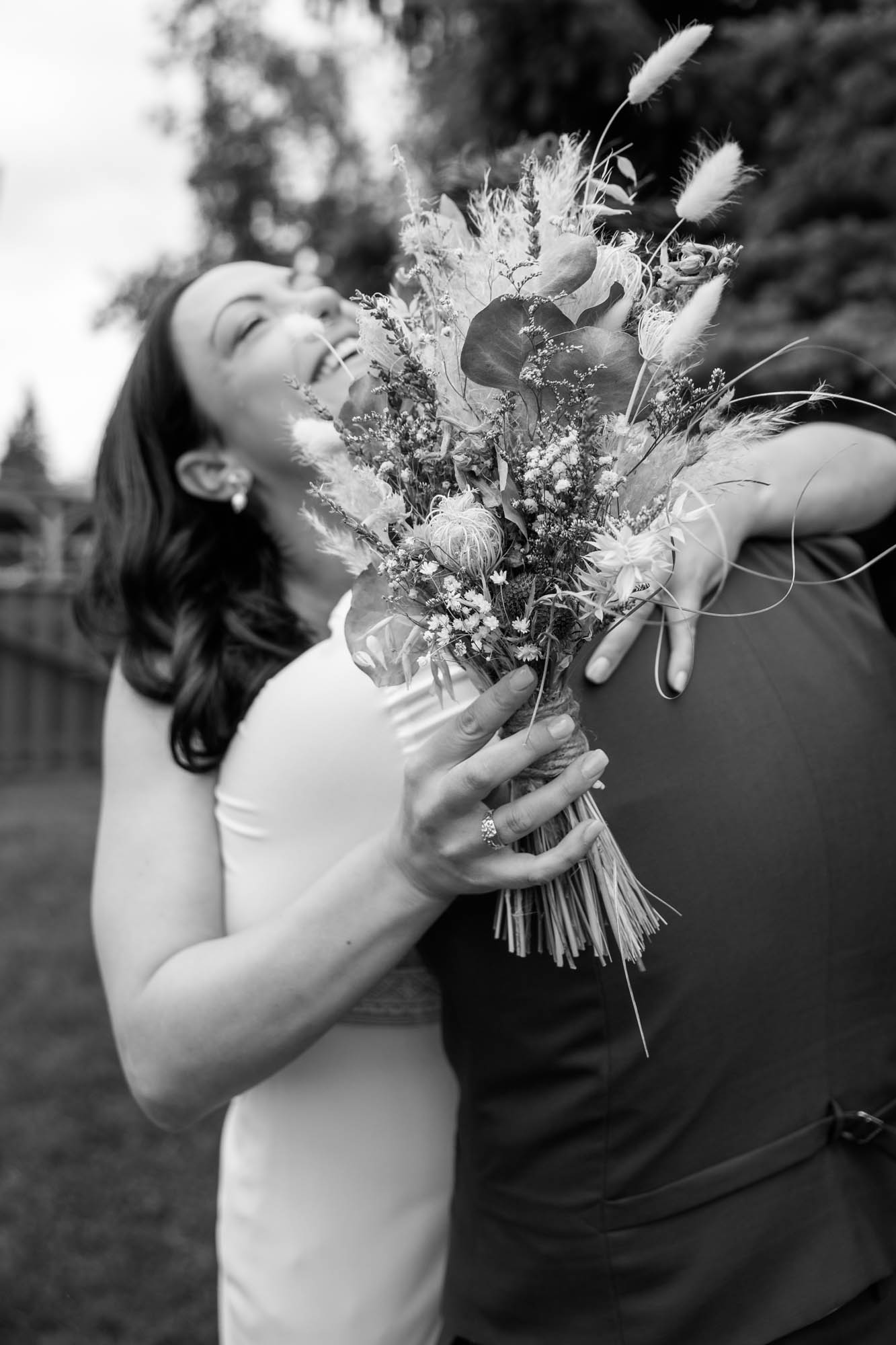 Calgary wedding photographer, candid photos of a micro intimate wedding at Two House Brewery small casual restaurant downtown Calgary