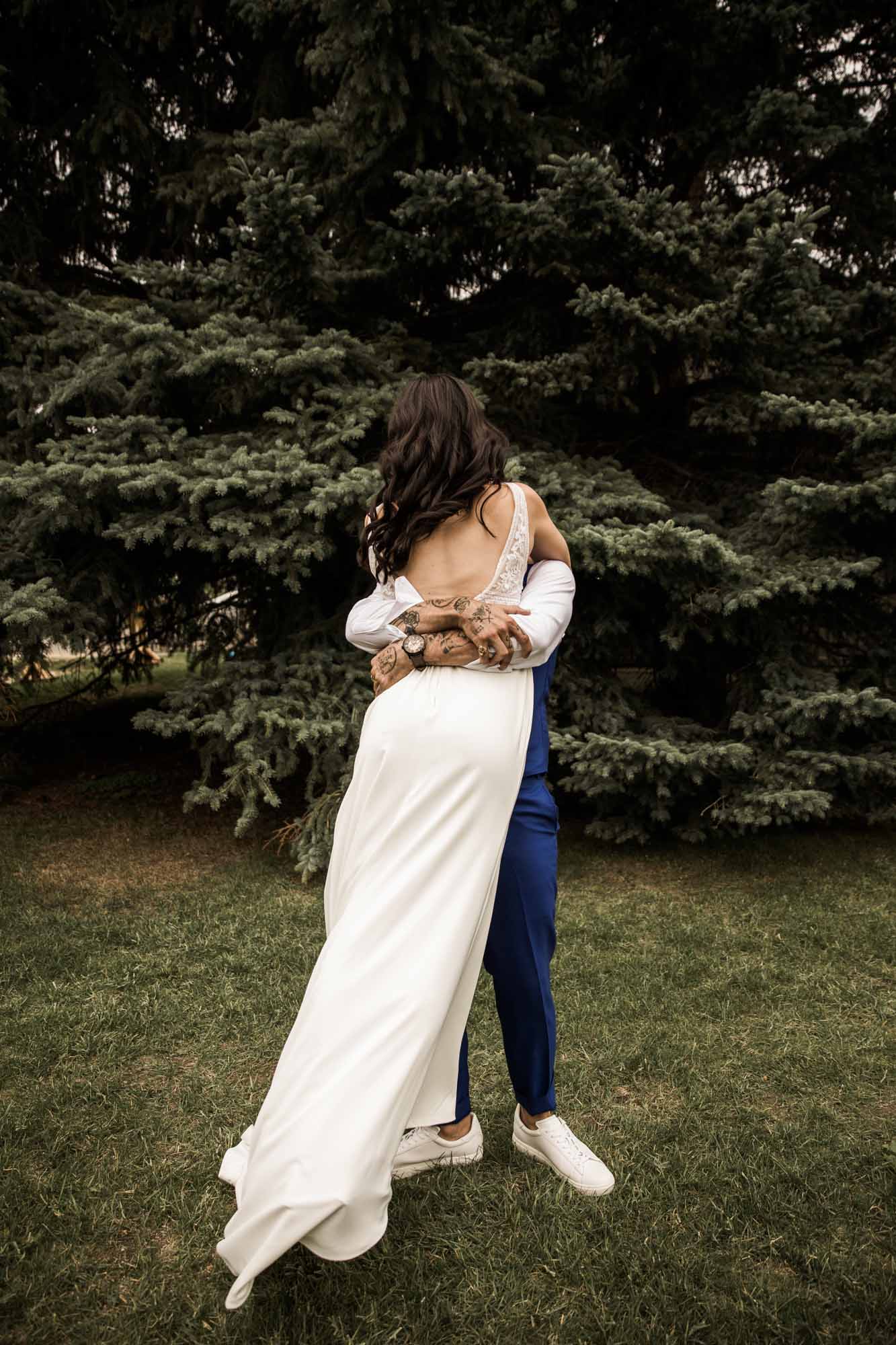 Calgary wedding photographer, candid photos of a micro intimate wedding at Two House Brewery small casual restaurant downtown Calgary