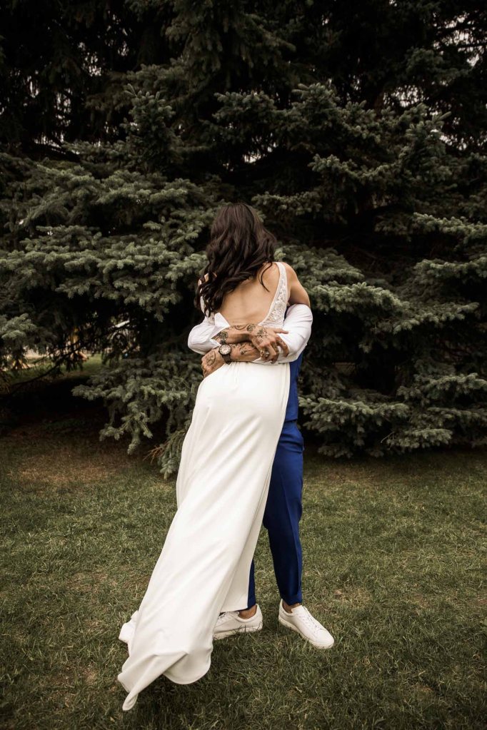 Calgary wedding photographer, candid photos of a micro intimate wedding at Two House Brewery small casual restaurant downtown Calgary