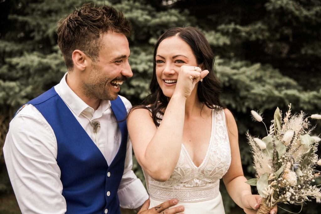 Calgary wedding photographer, candid photos of a micro intimate wedding at Two House Brewery small casual restaurant downtown Calgary