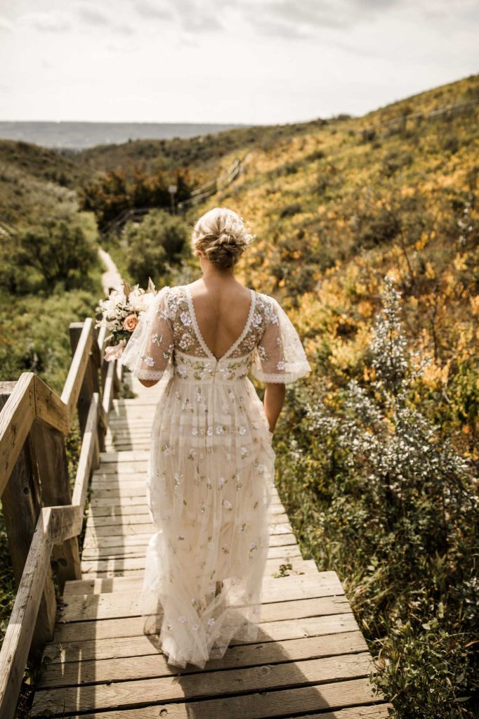 Wild Rose Brewery Calgary Wedding Photographer, couple on their wedding day at Bowmont Park, the Botanical Gardens of Silver Springs and Wild Rose Brewery