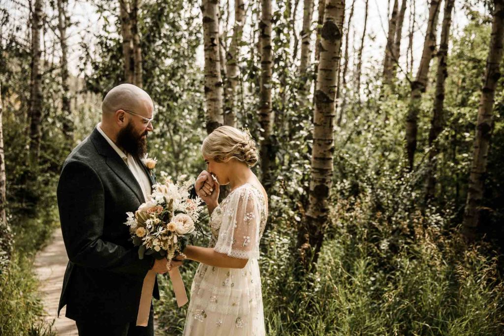 Wild Rose Brewery Calgary Wedding Photographer, couple on their wedding day at Bowmont Park, the Botanical Gardens of Silver Springs and Wild Rose Brewery