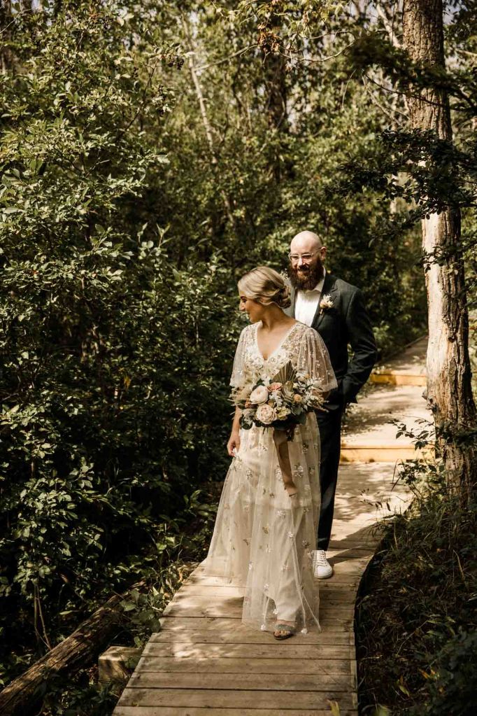 Wild Rose Brewery Calgary Wedding Photographer, couple on their wedding day at Bowmont Park, the Botanical Gardens of Silver Springs and Wild Rose Brewery