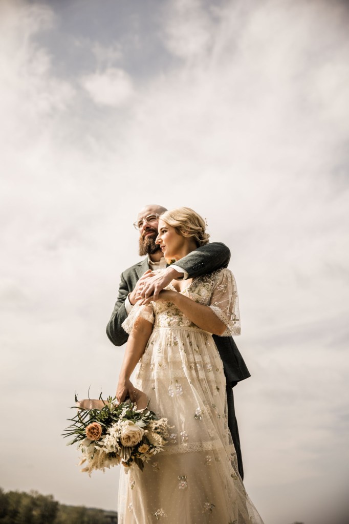 Wild Rose Brewery Calgary Wedding Photographer, couple on their wedding day at Bowmont Park, the Botanical Gardens of Silver Springs and Wild Rose Brewery