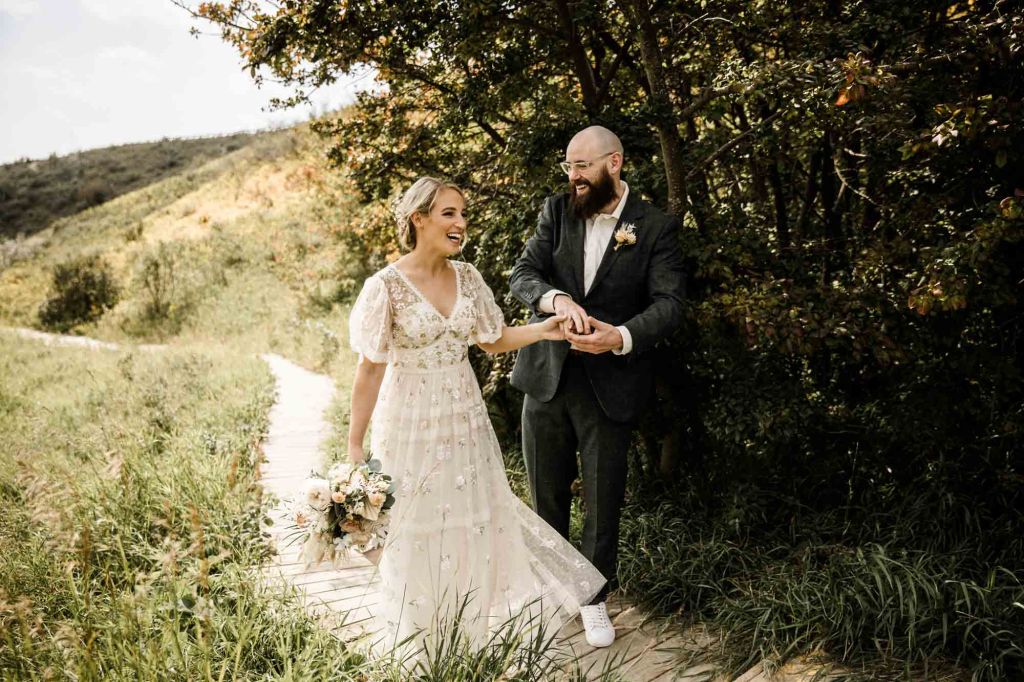 Wild Rose Brewery Calgary Wedding Photographer, couple on their wedding day at Bowmont Park, the Botanical Gardens of Silver Springs and Wild Rose Brewery