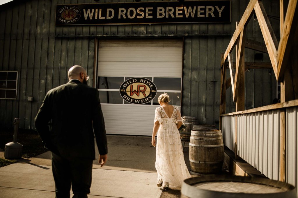 Wild Rose Brewery Calgary Wedding Photographer, couple on their wedding day at Bowmont Park, the Botanical Gardens of Silver Springs and Wild Rose Brewery