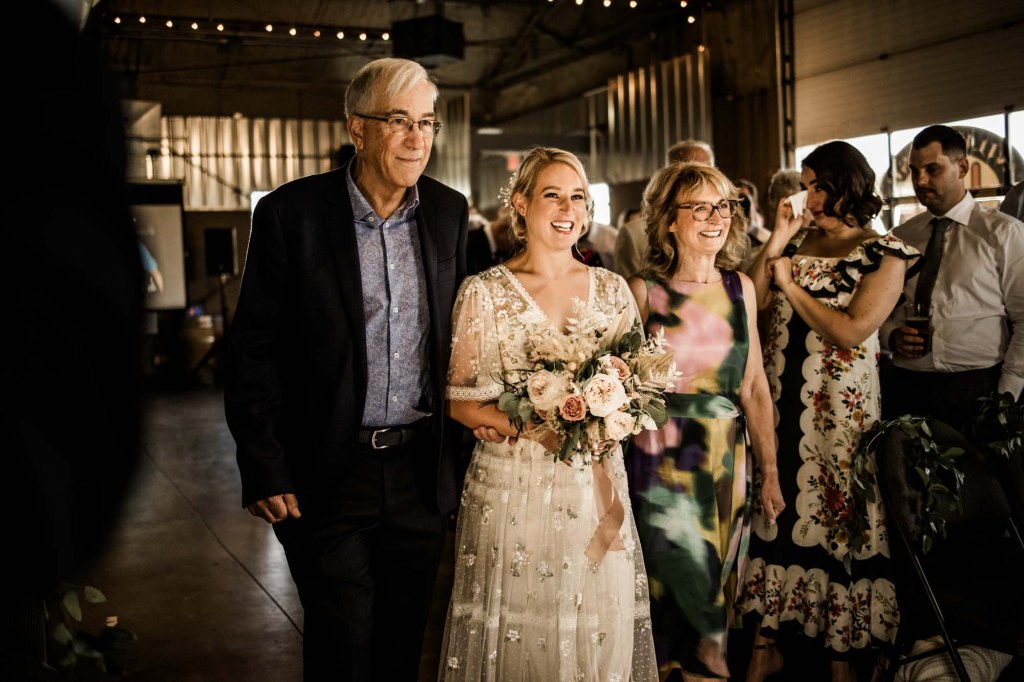 Wild Rose Brewery Calgary Wedding Photographer, couple on their wedding day at Bowmont Park, the Botanical Gardens of Silver Springs and Wild Rose Brewery