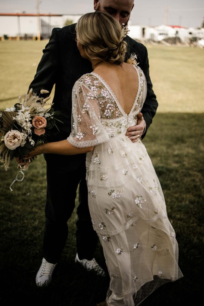 Wild Rose Brewery Calgary Wedding Photographer, couple on their wedding day at Bowmont Park, the Botanical Gardens of Silver Springs and Wild Rose Brewery